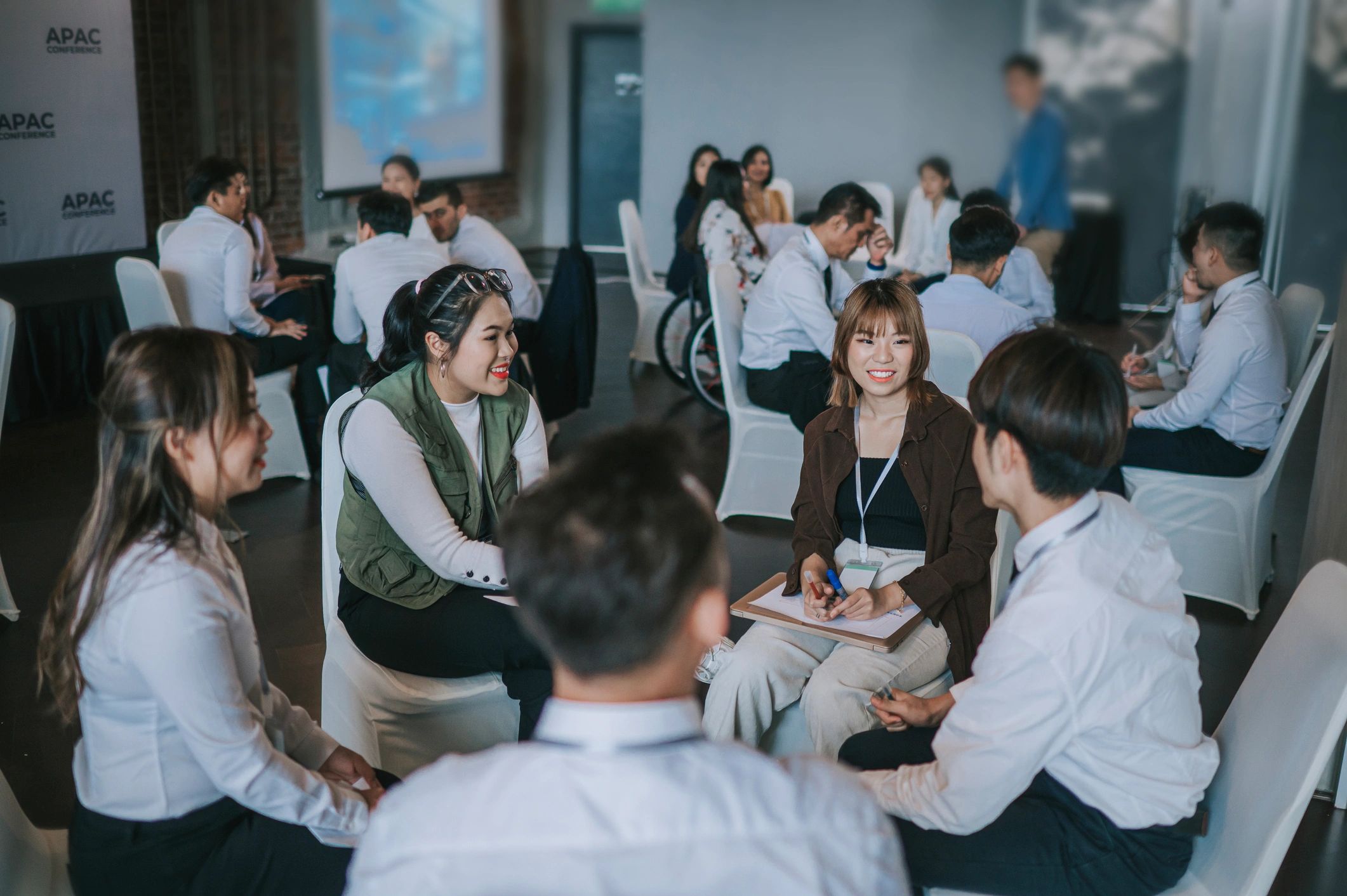 Business workshop participants collaborating during a marketing training session